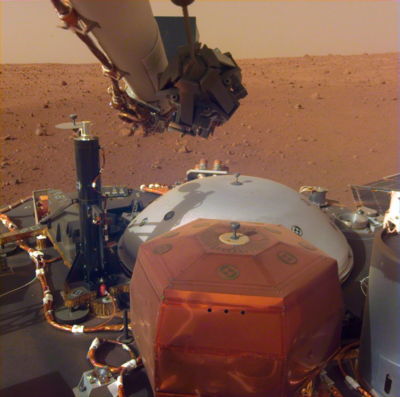 The Martian surface, as imaged by the Instrument Deployment Camera attached to InSight’s robotic arm.